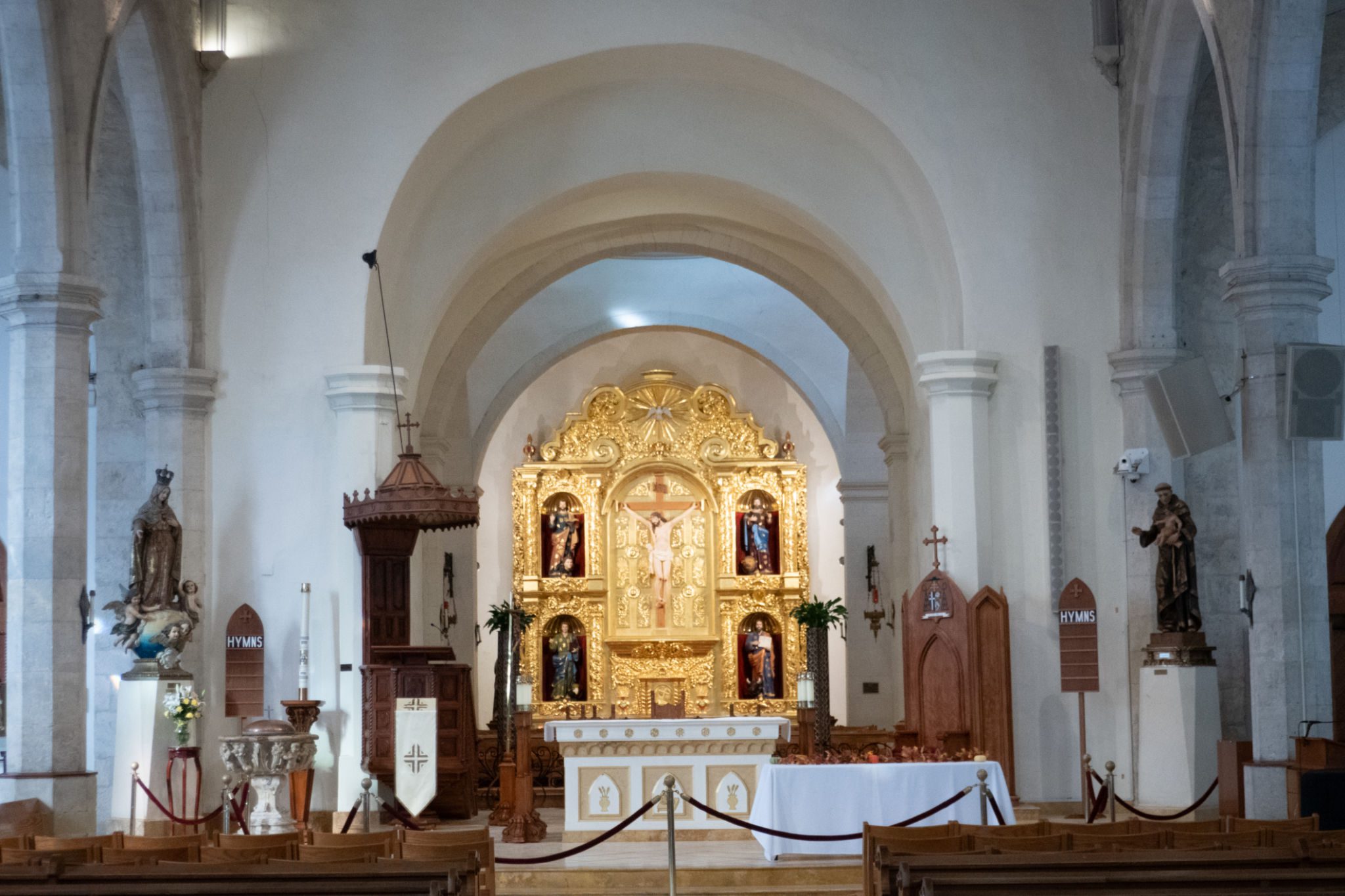 Ornate church altar with religious icons displayed.